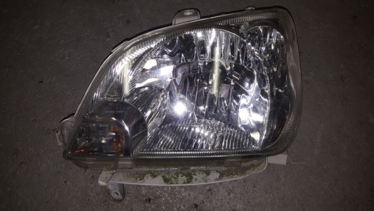 Koplamp Daihatsu Cuore 2004 links